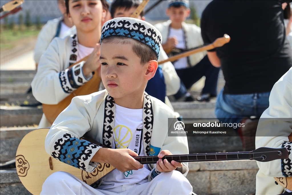 Kazakh singer and music teacher Ibragim Eskendir gives dombra lessons in Astana