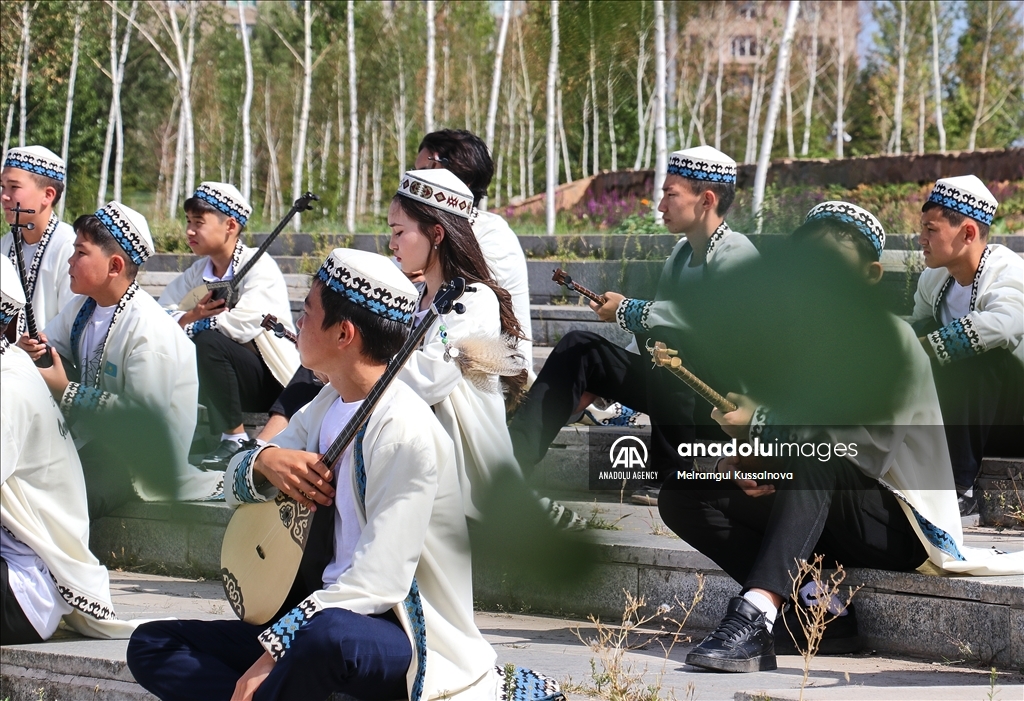 Kazakh singer and music teacher Ibragim Eskendir gives dombra lessons in Astana