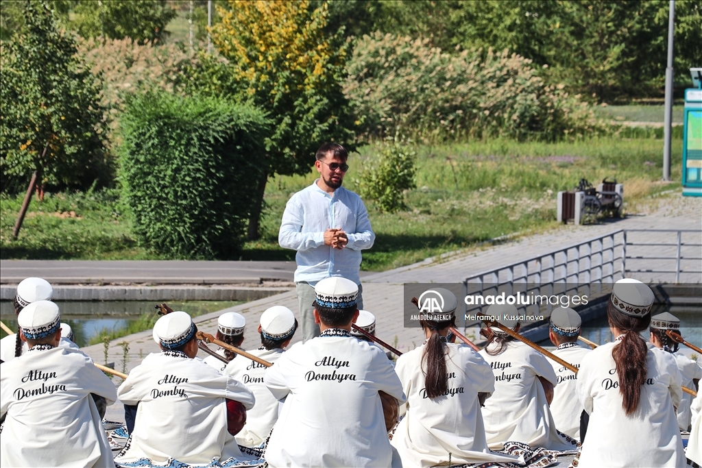 Kazakh singer and music teacher Ibragim Eskendir gives dombra lessons in Astana