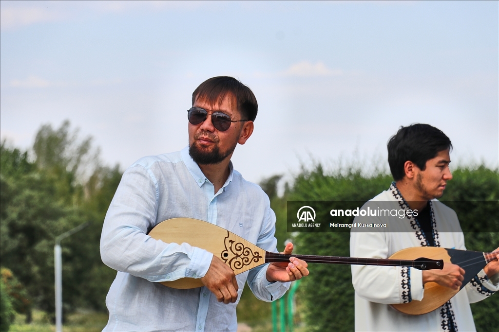 Kazakh singer and music teacher Ibragim Eskendir gives dombra lessons in Astana
