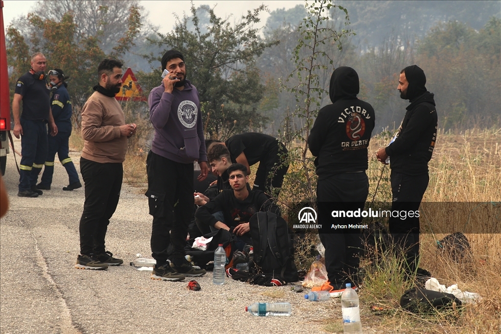 Irregular migrants stranded during wildfire in Dadia village of Greece