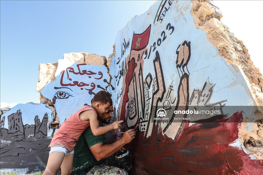 إدلب.. رسّام سوري يتضامن مع منكوبي زلزال المغرب بطريقته الخاصة