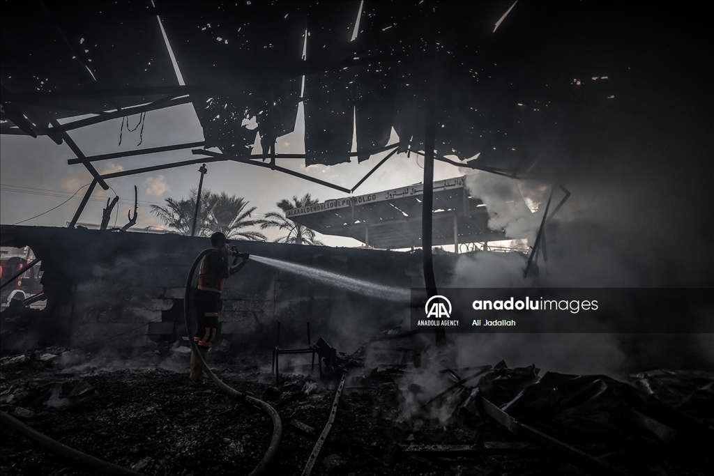 UNRWA warehouse engulfed in flames amidst Israeli bombardment