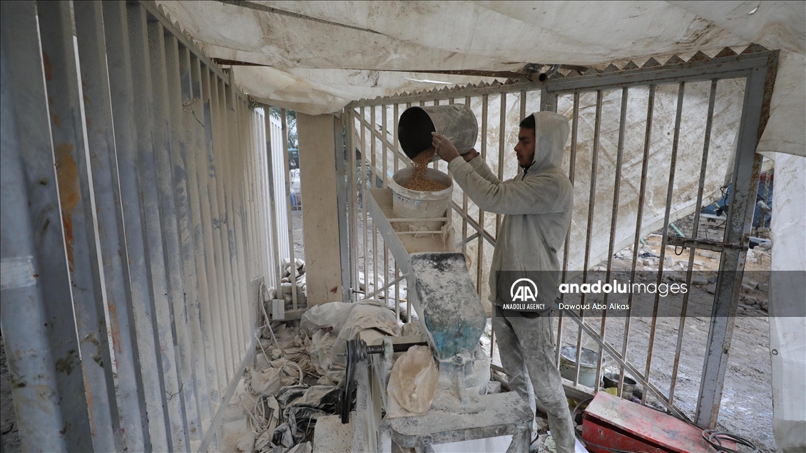 Palestinians forced to grind animal fodder to make bread due to wheat flour shortage