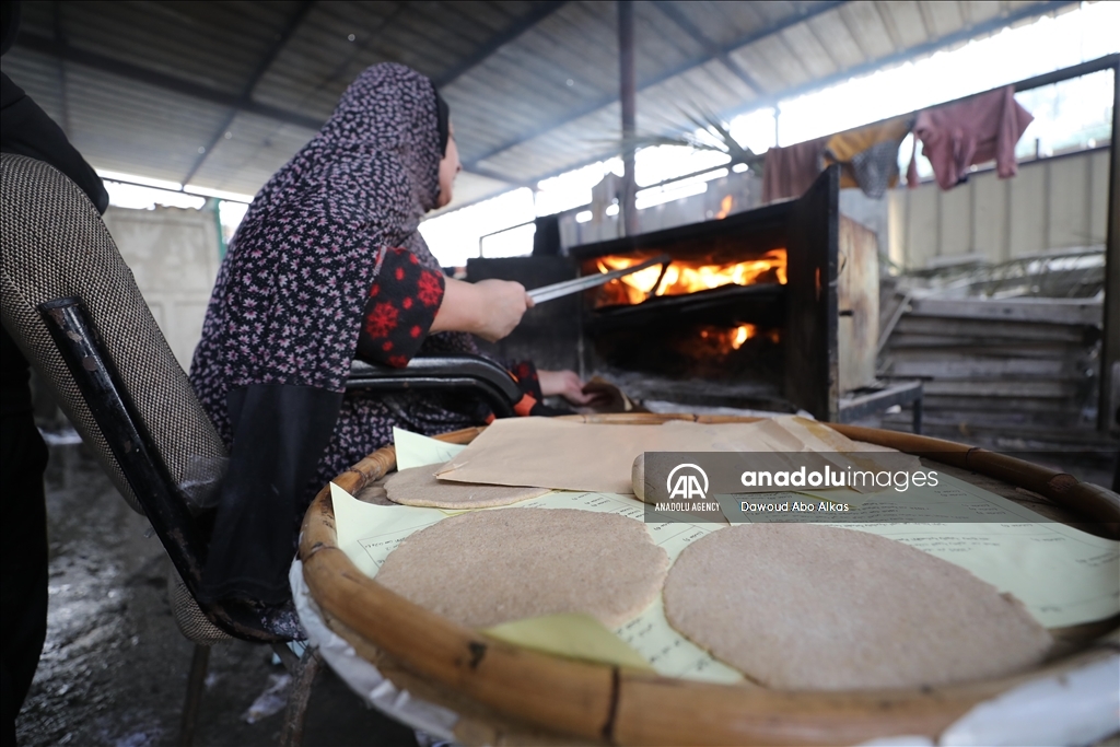 Palestinians forced to grind animal fodder to make bread due to wheat flour shortage