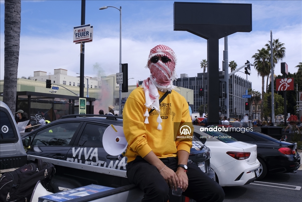 Pro-Palestinian protesters demonstrate during the 96th Academy Awards