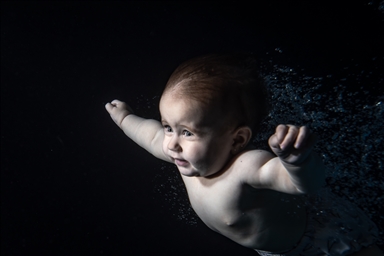 Babies receive swimming and diving training in Istanbul