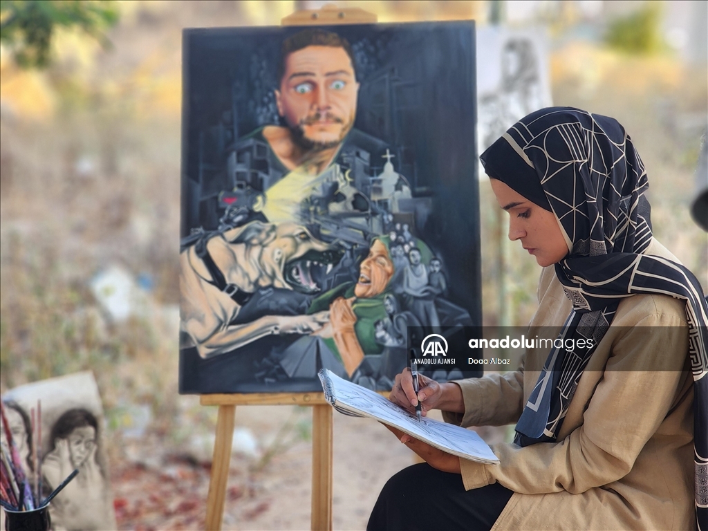 Filistinli ressam, İsrail saldırıları altındaki Gazze halkının acılarını çizimleriyle yansıtıyor