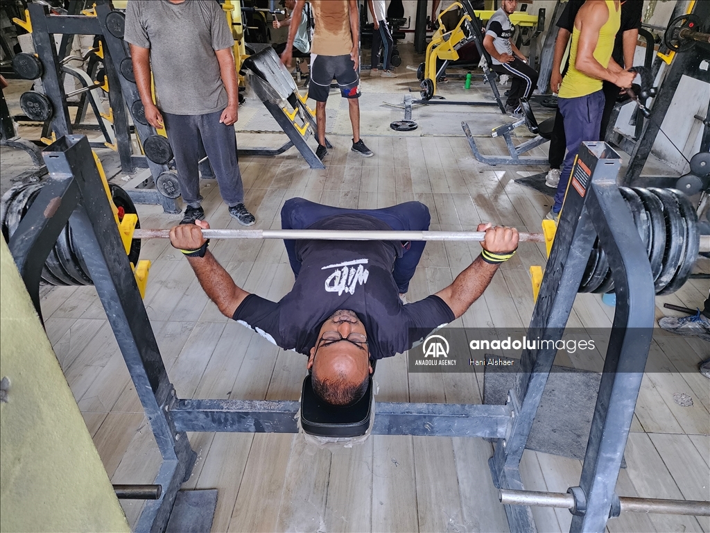 Palestinians try to continue training in damaged gym in Khan Yunis