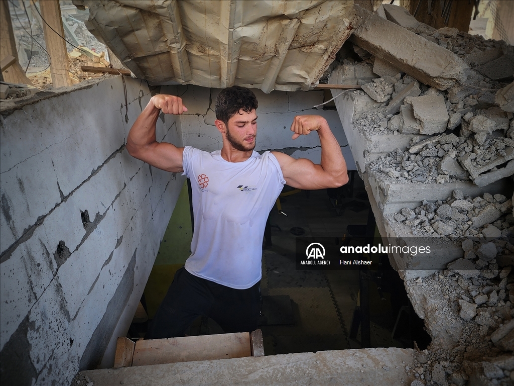 Palestinians try to continue training in damaged gym in Khan Yunis