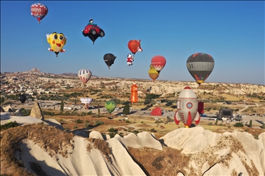 Hot air balloons with figures from 18 countries fly in Cappadocia