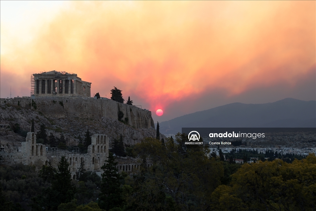 Smoke rises over Parthenon temple during a wildfire in Athens