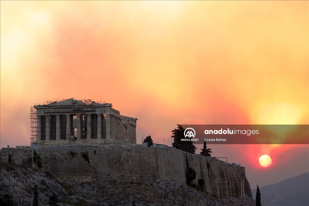 Smoke rises over Parthenon temple during a wildfire in Athens