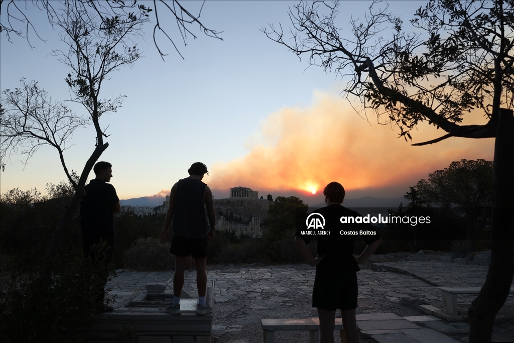 Smoke rises over Parthenon temple during a wildfire in Athens