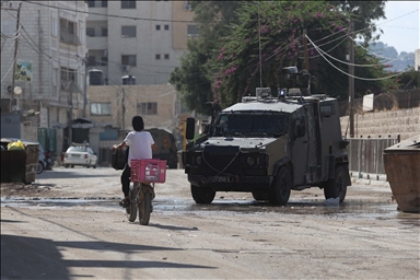 كاسرا حصار إسرائيل.. فتى فلسطيني يتطوع لخدمة المرضى بمستشفى جنين