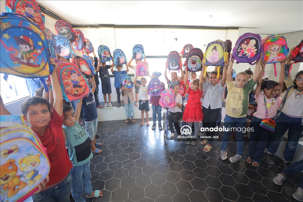 School bags and stationery supplies distributed to children in Gaza