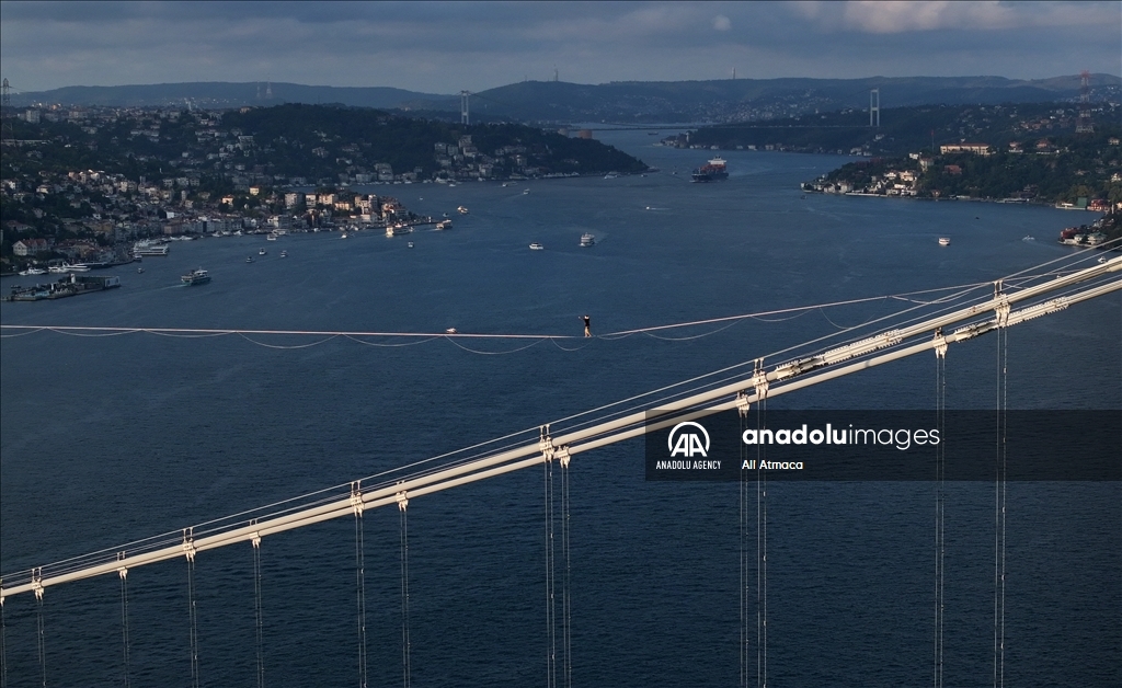 Red Bull athlete Jaan Roose walks tightrope from Asia to Europe over bridge in Turkiye's Istanbul