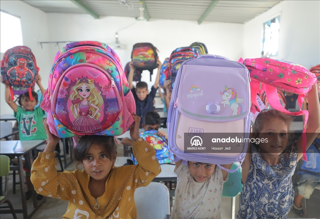 School bags and stationery supplies distributed to children in Gaza