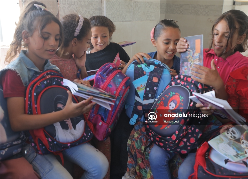 School bags and stationery supplies distributed to children in Gaza