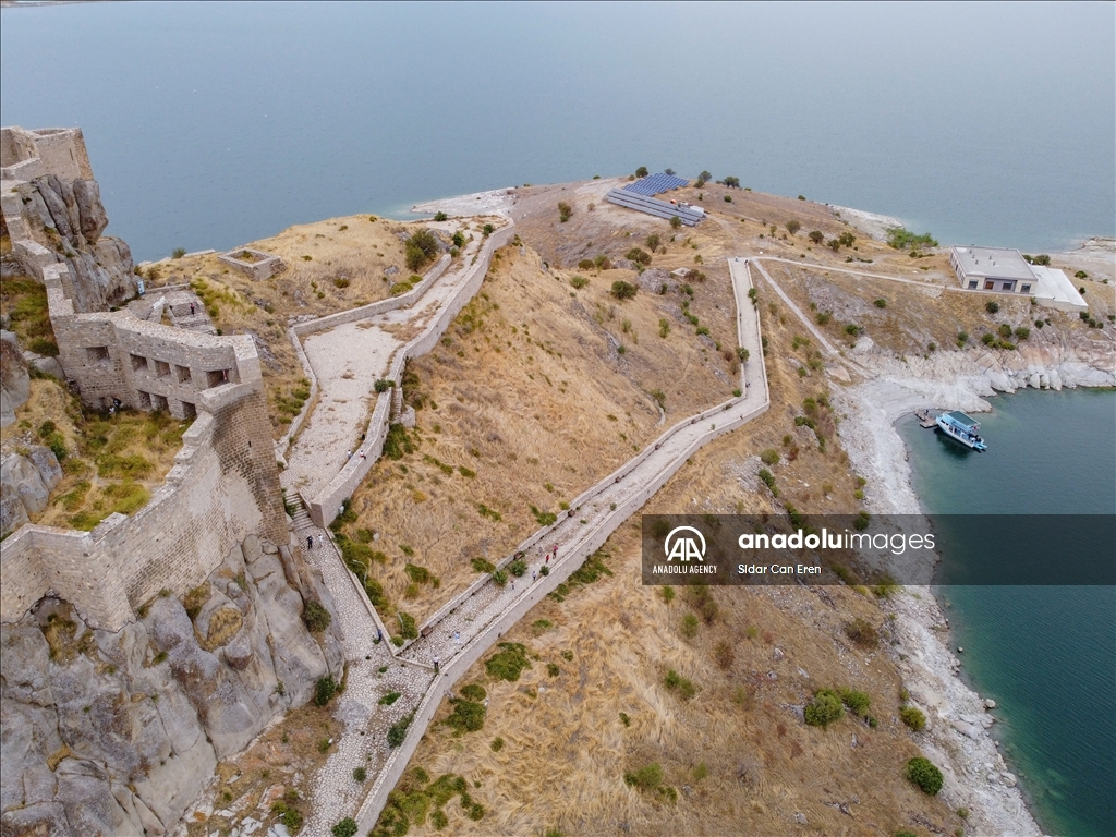 The allure of historic Pertek Castle in Turkiye's Tunceli is amplified by boat tours