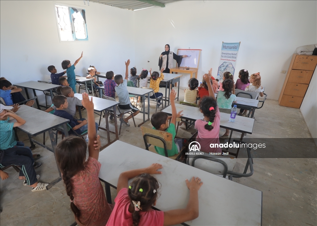 School bags and stationery supplies distributed to children in Gaza