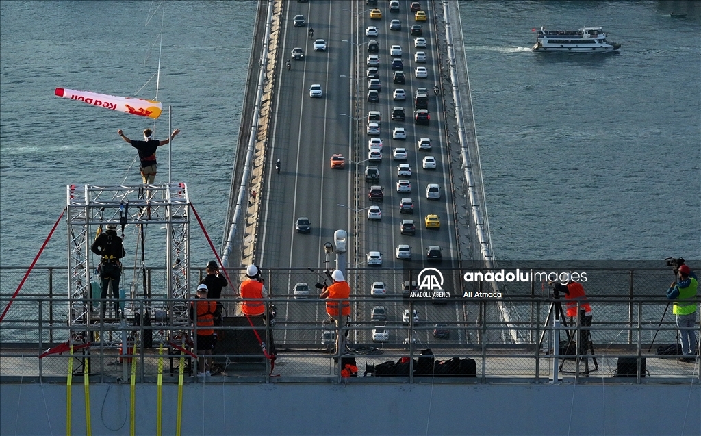 Red Bull athlete Jaan Roose walks tightrope from Asia to Europe over bridge in Turkiye's Istanbul