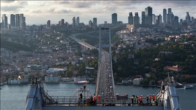 Red Bull athlete Jaan Roose walks tightrope from Asia to Europe over bridge in Turkiye's Istanbul