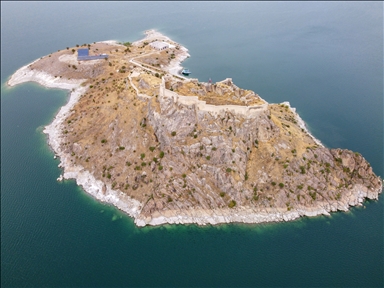 The allure of historic Pertek Castle in Turkiye's Tunceli is amplified by boat tours