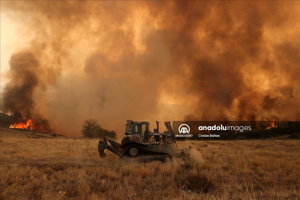 Wildfire burns in the Village of Gelini near Corinth, Greece