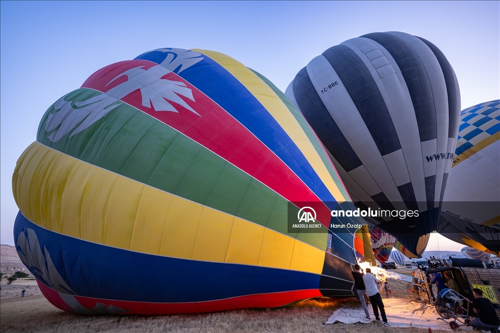 Hot air balloons fly over Cappadocia