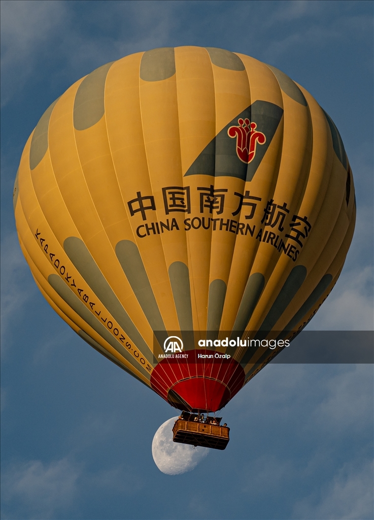 Hot air balloons fly over Cappadocia