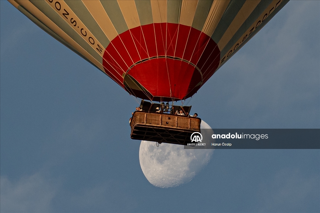 Hot air balloons fly over Cappadocia