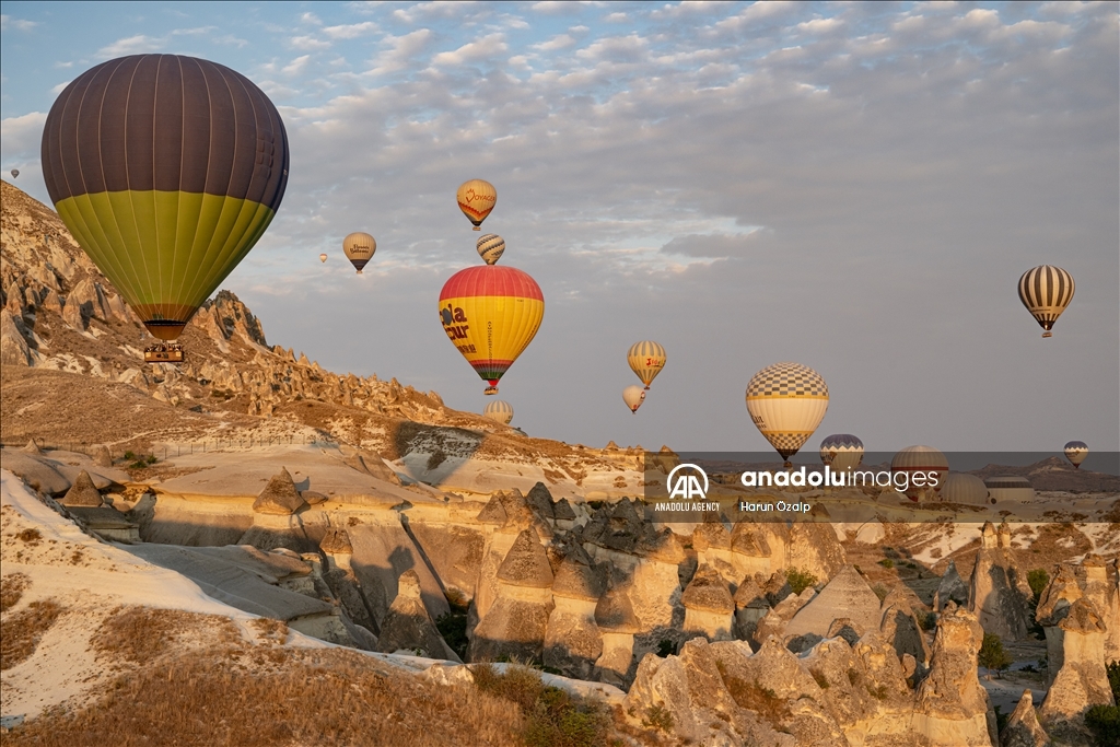 Hot air balloons fly over Cappadocia