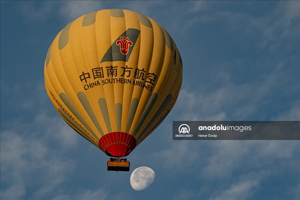 Hot air balloons fly over Cappadocia