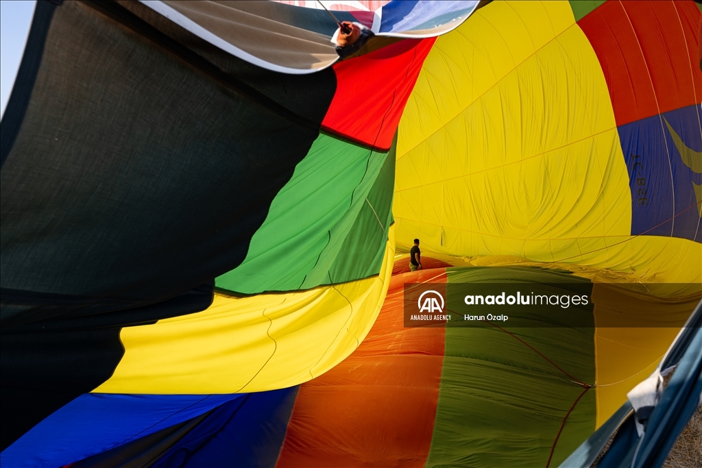 Hot air balloons fly over Cappadocia