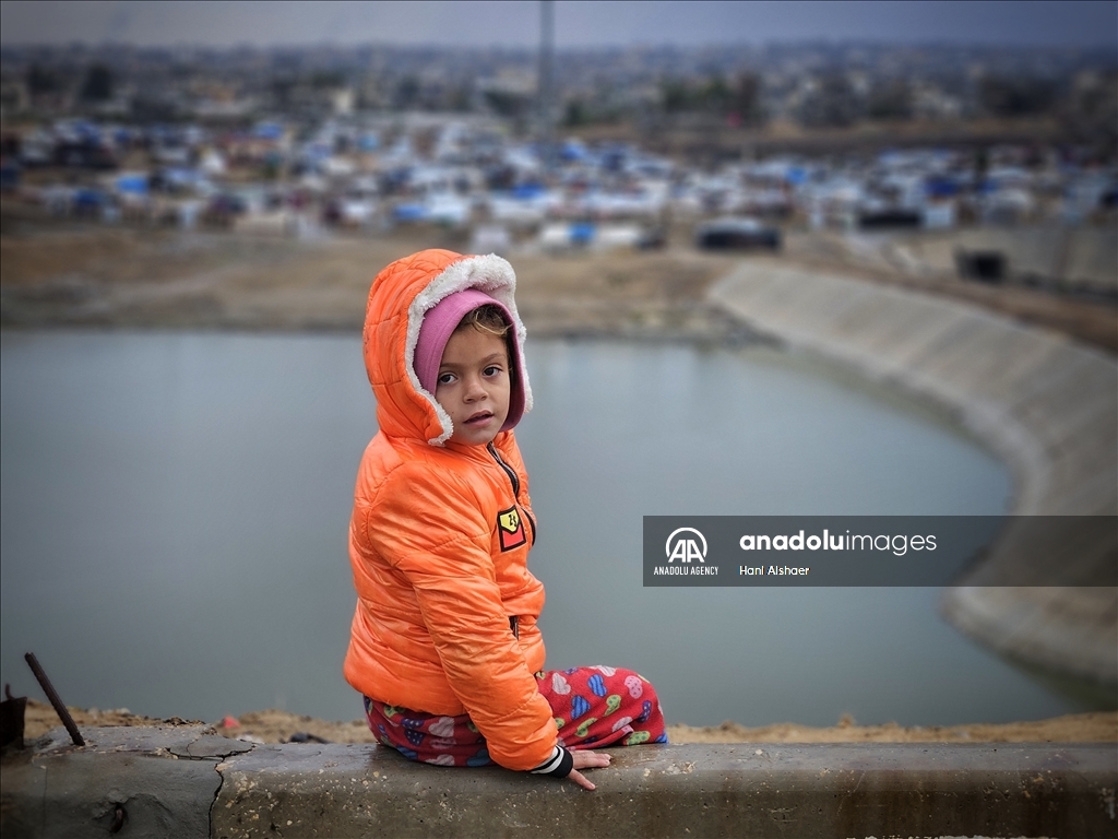 Palestinians living in tents due to Israeli attacks struggle with the cold weather