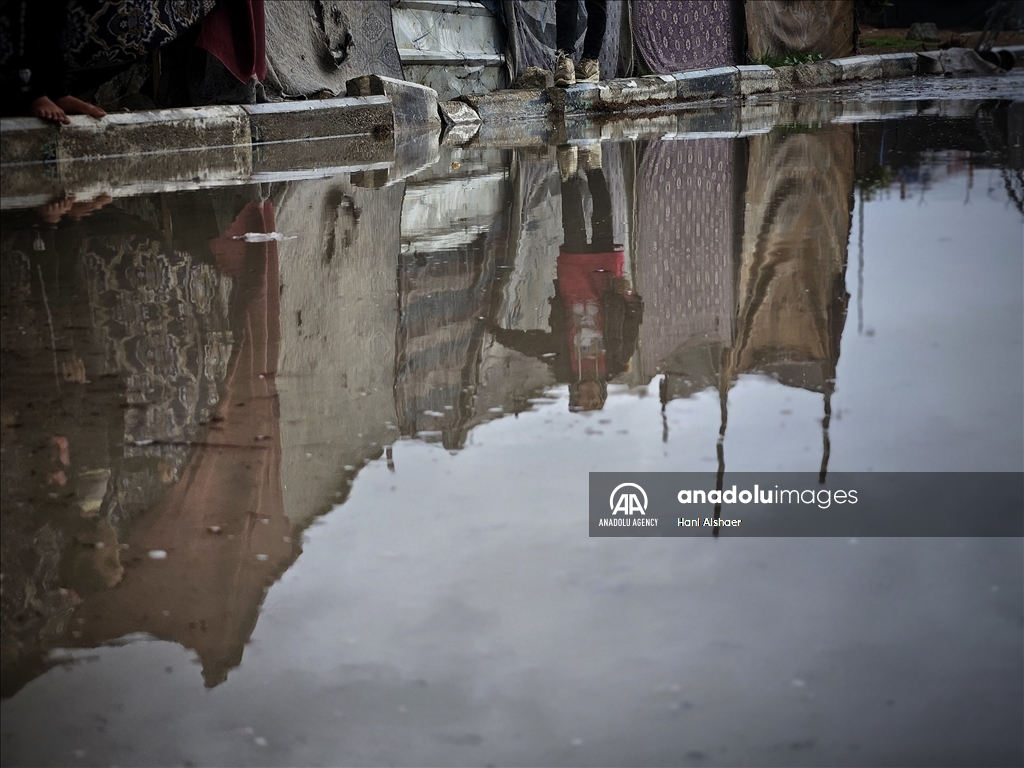 Palestinians living in tents due to Israeli attacks struggle with the cold weather