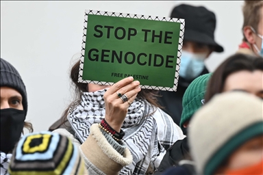 Pro-Palestinian demonstrators block the entrance to the Foreign Office in the UK