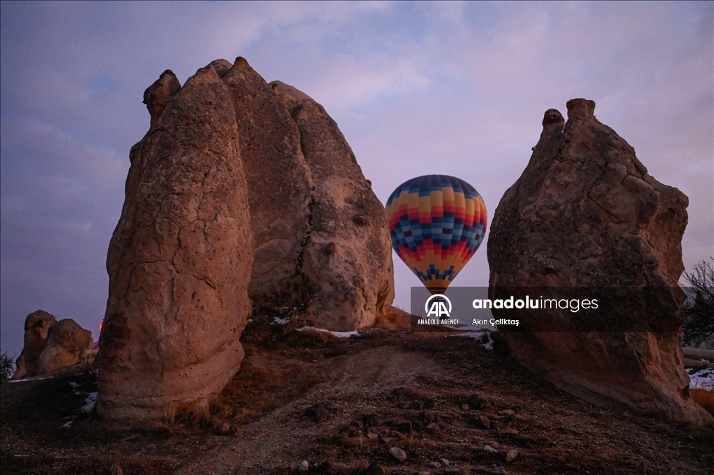 Hot air balloons with "Palestinian keffiyeh" pattern rise above Cappadocia