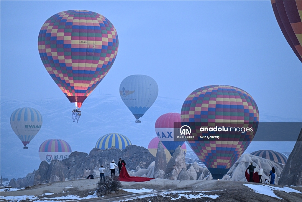 Hot air balloons with "Palestinian keffiyeh" pattern rise above Cappadocia