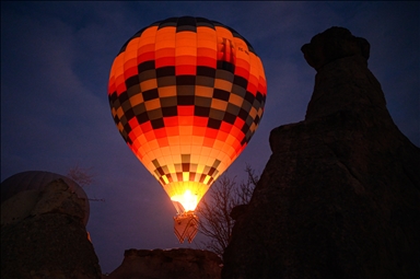 Hot air balloons with "Palestinian keffiyeh" pattern rise above Cappadocia