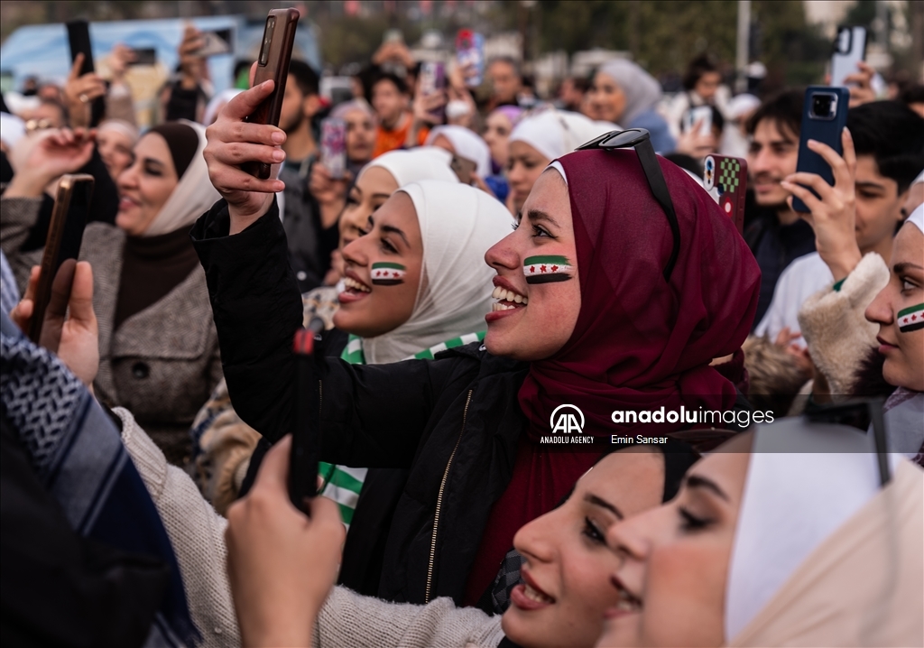 Syrians in Damascus celebrate the collapse of 61-Year Baath Regime