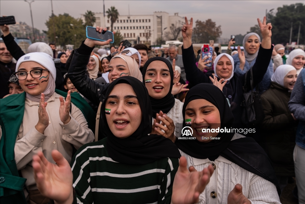 Syrians in Damascus celebrate the collapse of 61-Year Baath Regime