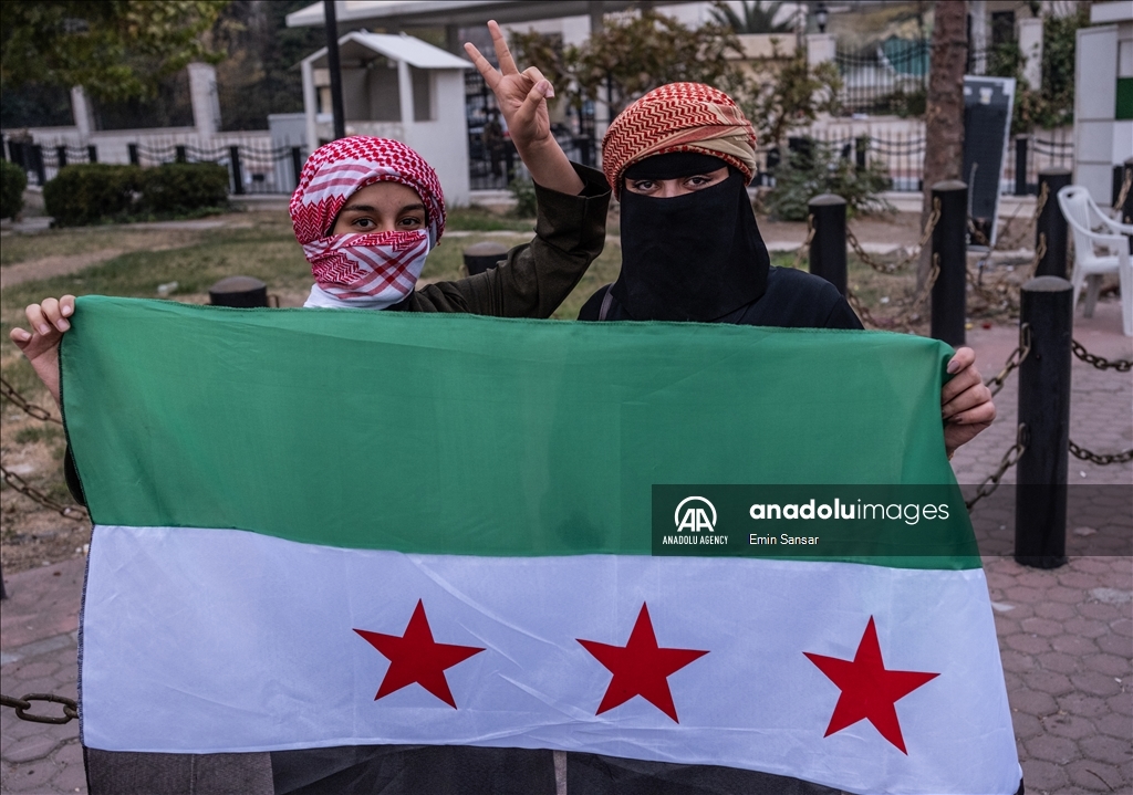 Syrians in Damascus celebrate the collapse of 61-Year Baath Regime