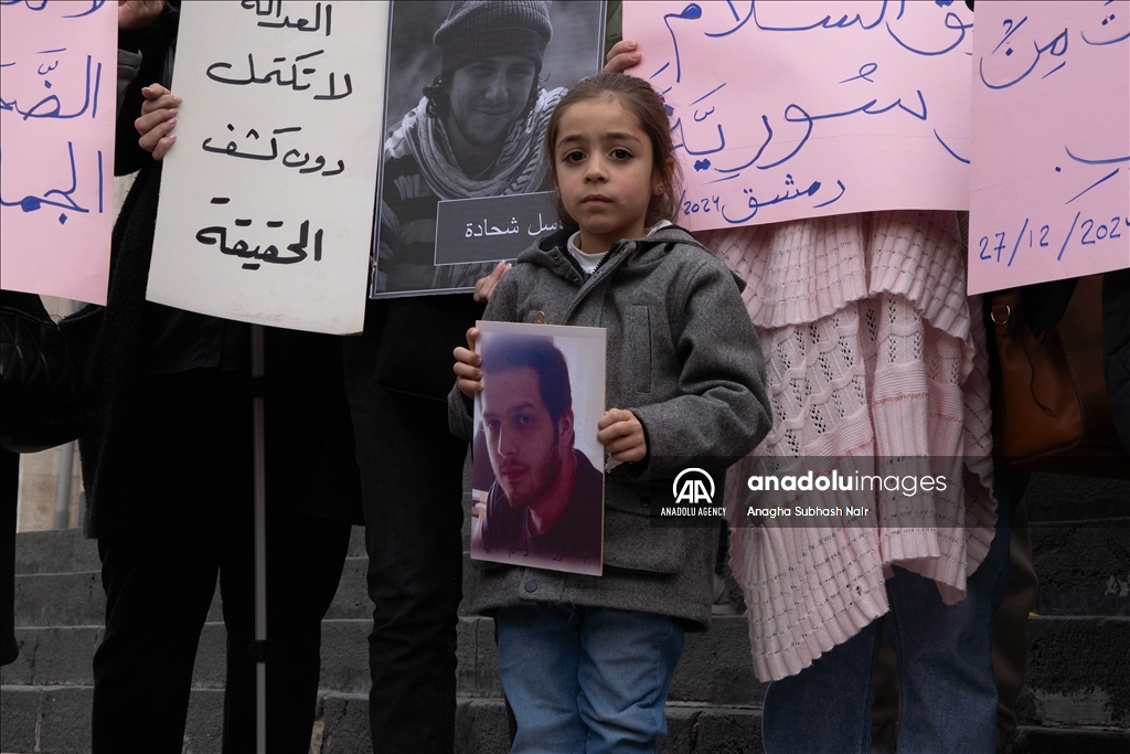 Relatives of Baath regime detainees demonstrate in Damascus