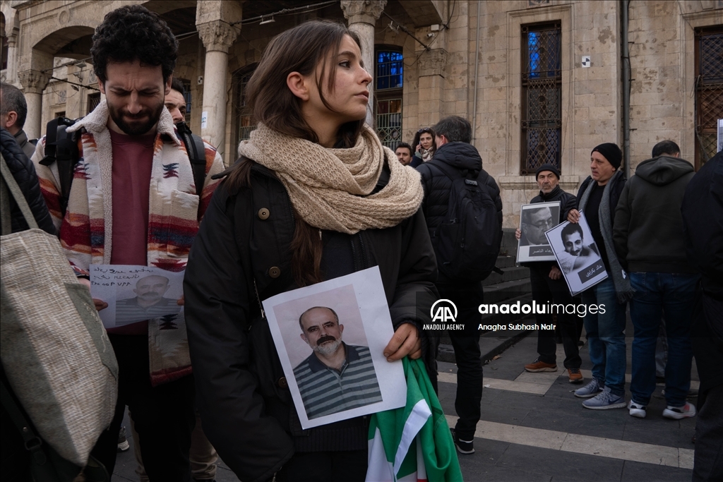 Relatives of Baath regime detainees demonstrate in Damascus