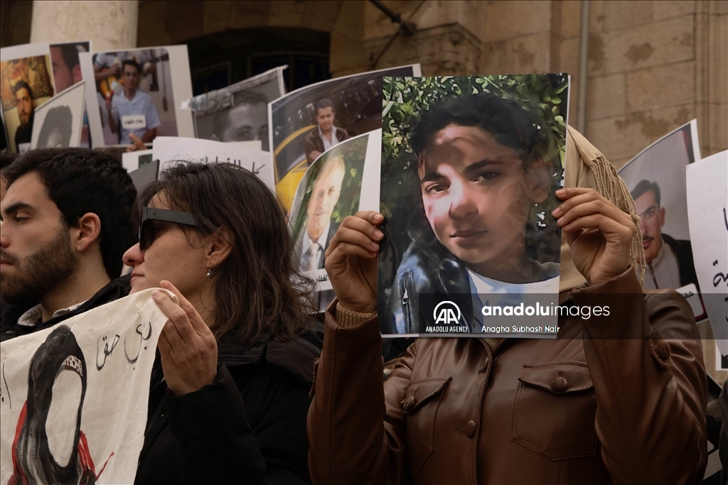 Relatives of Baath regime detainees demonstrate in Damascus