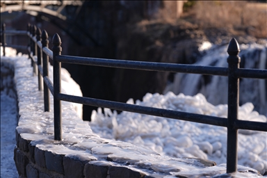 New Jersey's Paterson Great Falls shrouded in ice as wildfires ravage West Coast