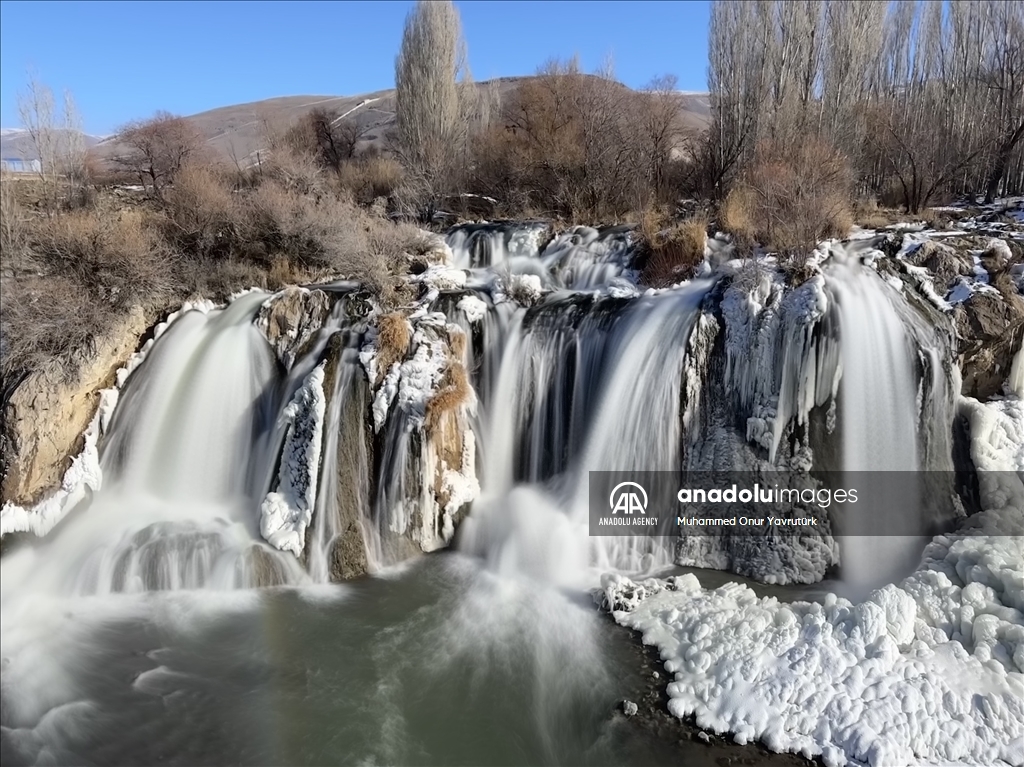 Partially frozen Muradiye Waterfall in Turkiye's Van