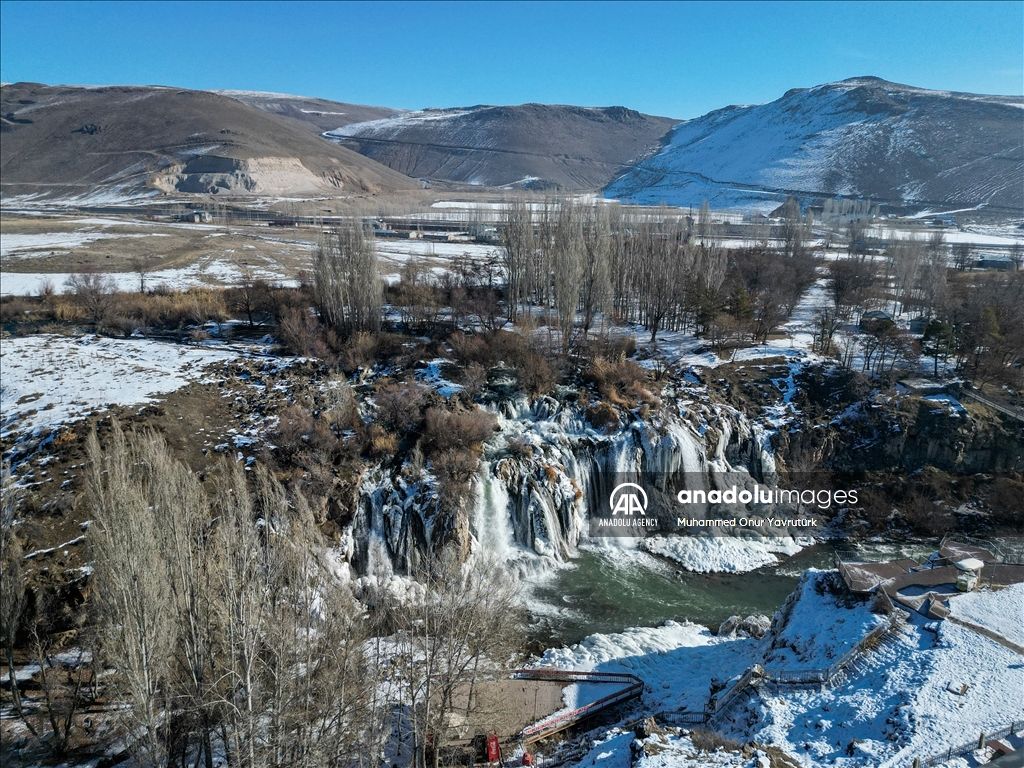 Partially frozen Muradiye Waterfall in Turkiye's Van